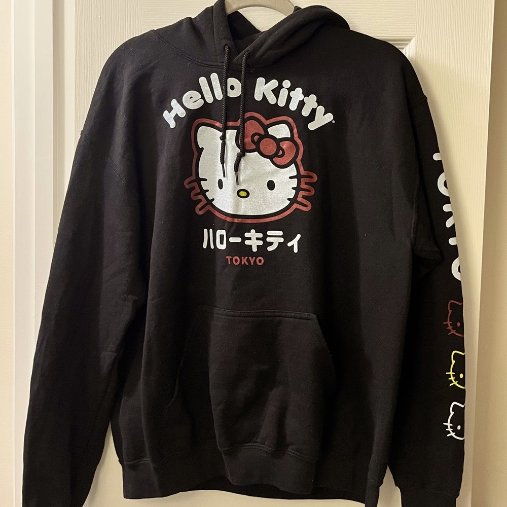 Black hello kitty hoodie, size large but runs a bit small.